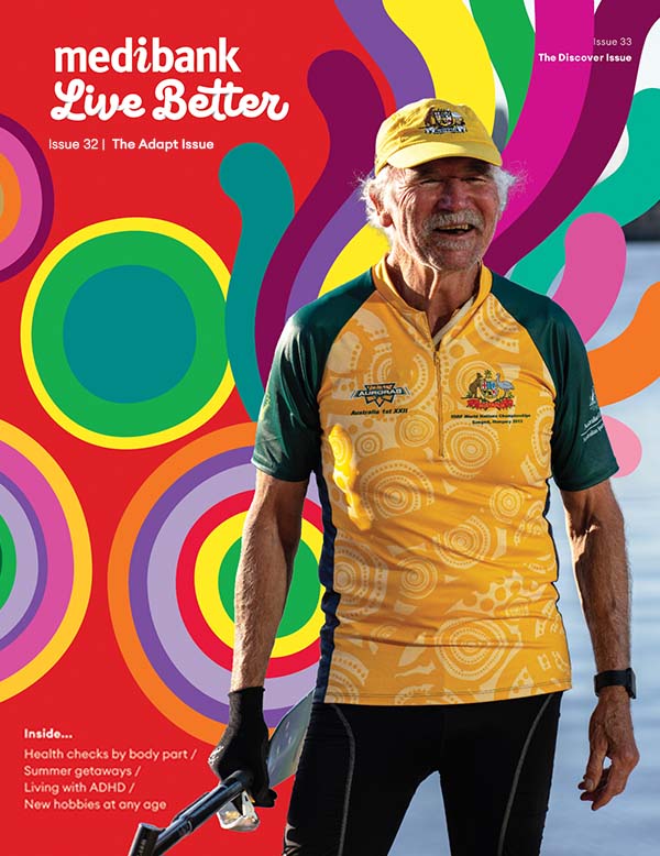 Cover of Live Better magazine - discover issue. An older man stands proudly in his dragon boating  uniform.