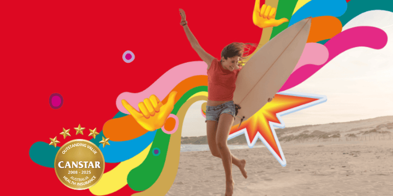 Woman with surfboard at the beach