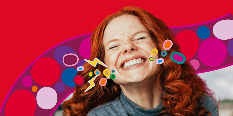 Girl smiling and showing off teeth