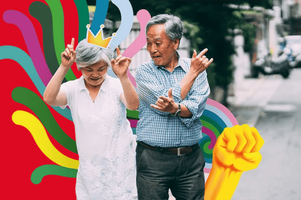 Senior couple dancing outside