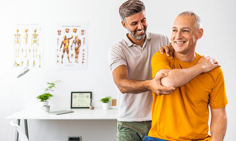 Man stretching during physio appointment