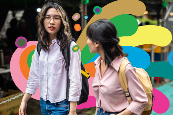Two women walking and talking
