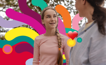 Teenage girl talking to adult