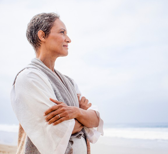 Women standing on beach