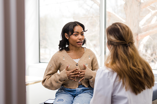 Woman talking to a healthcare professional
