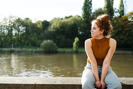 Woman sitting outside