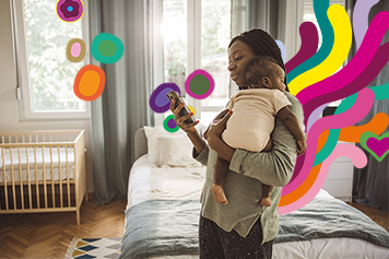 Woman with baby using mobile phone