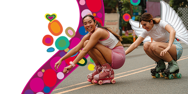 Two girls roller skating
