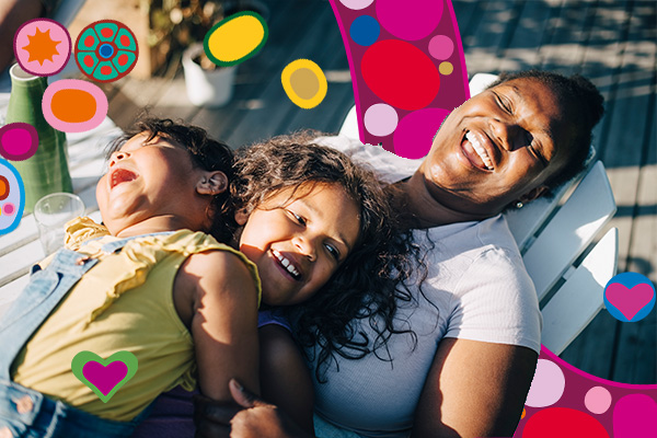 Mum laughing with her two children