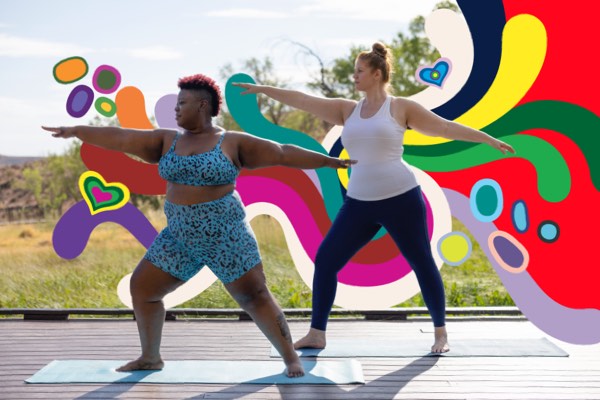 Two women doing yoga