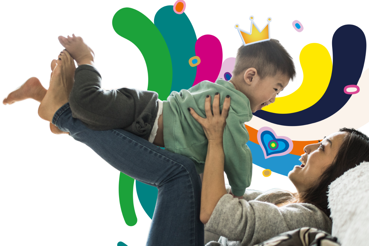 mom holding son on the couch