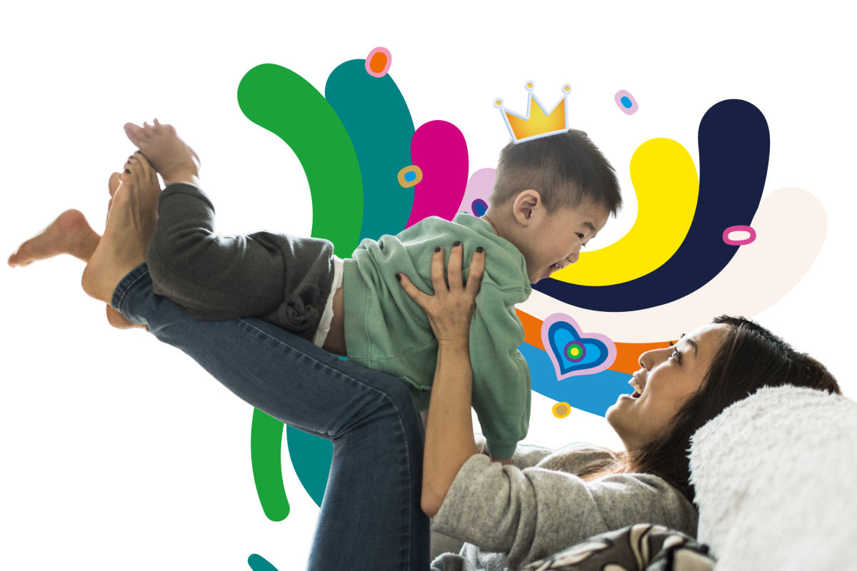 mom holding son on the couch