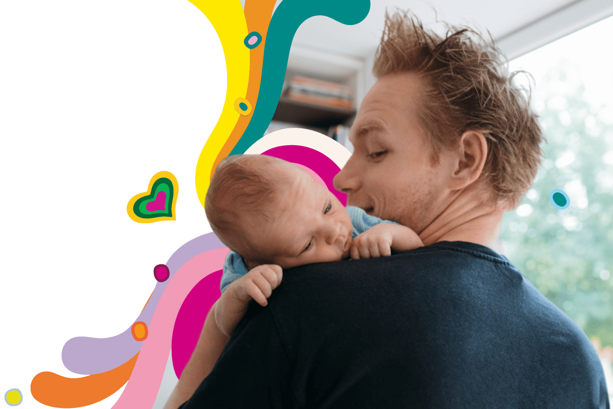 dad holding baby
