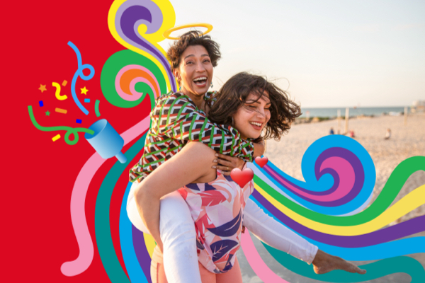 Two women hugging and smiling 