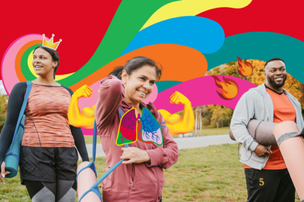 Woman smiling and walking while holding yoga mat