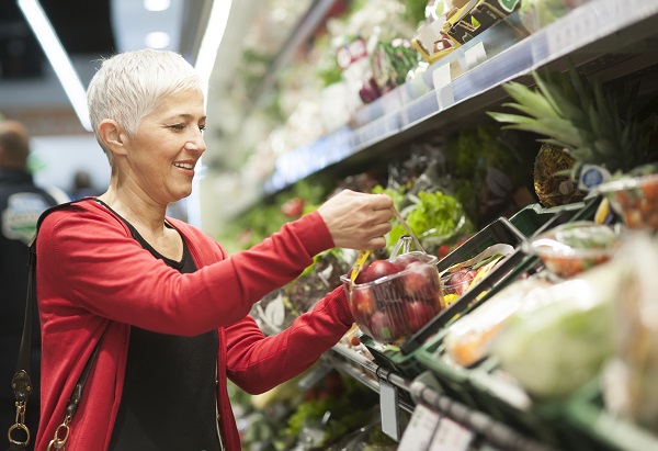 Mature woman shopping at supermarket