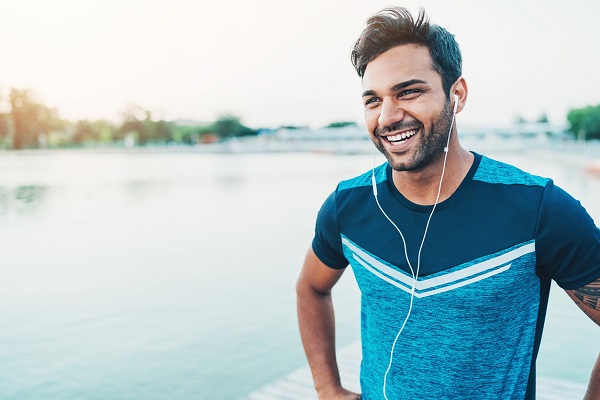 Portrait of a smiling young Middle-Eastern ethnicity athlete