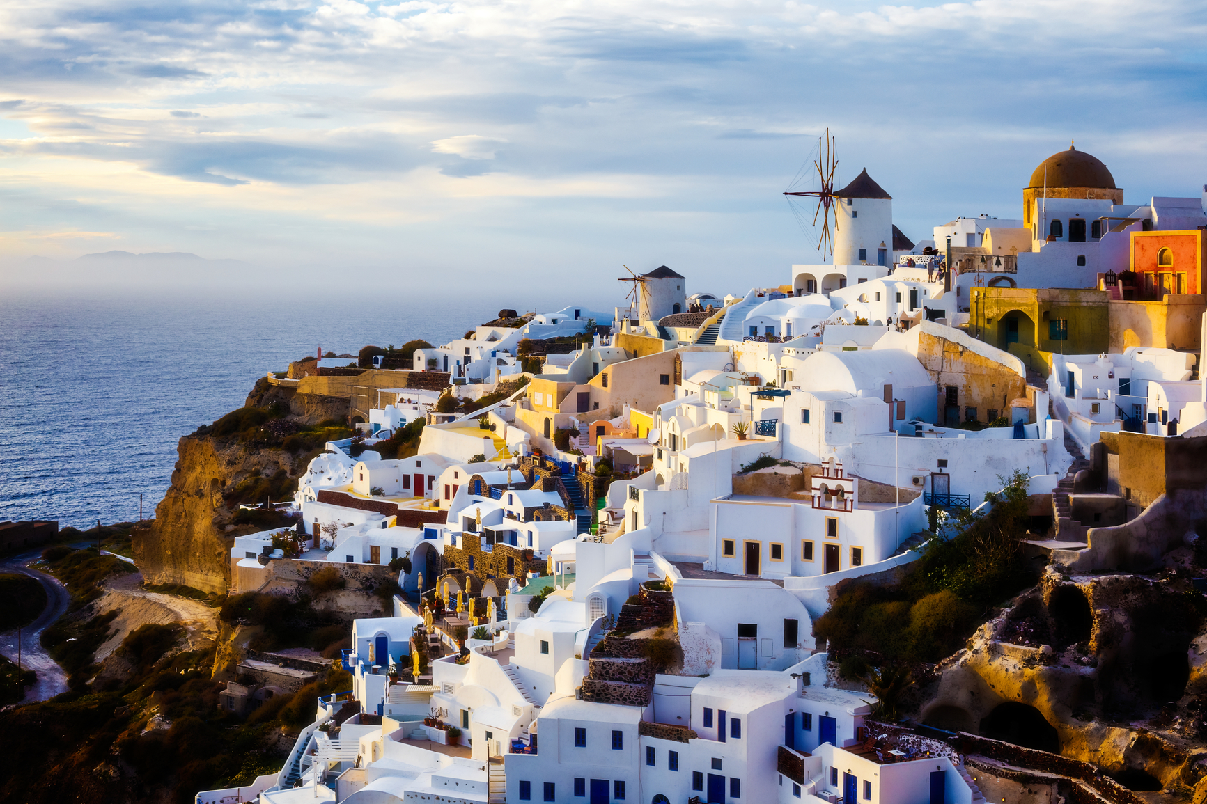 The beautiful traditional village of Oia, as it appears in the afternoon light,