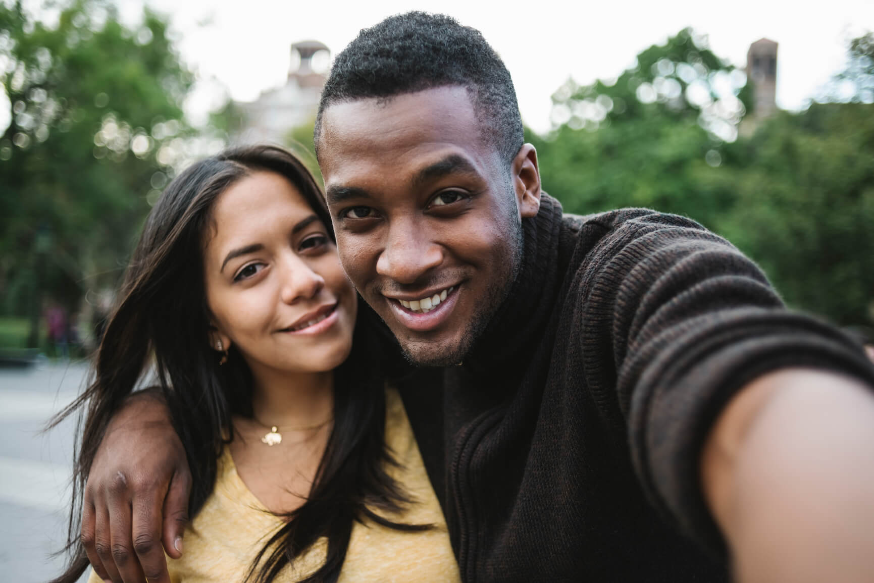 A couple embracing and laughing