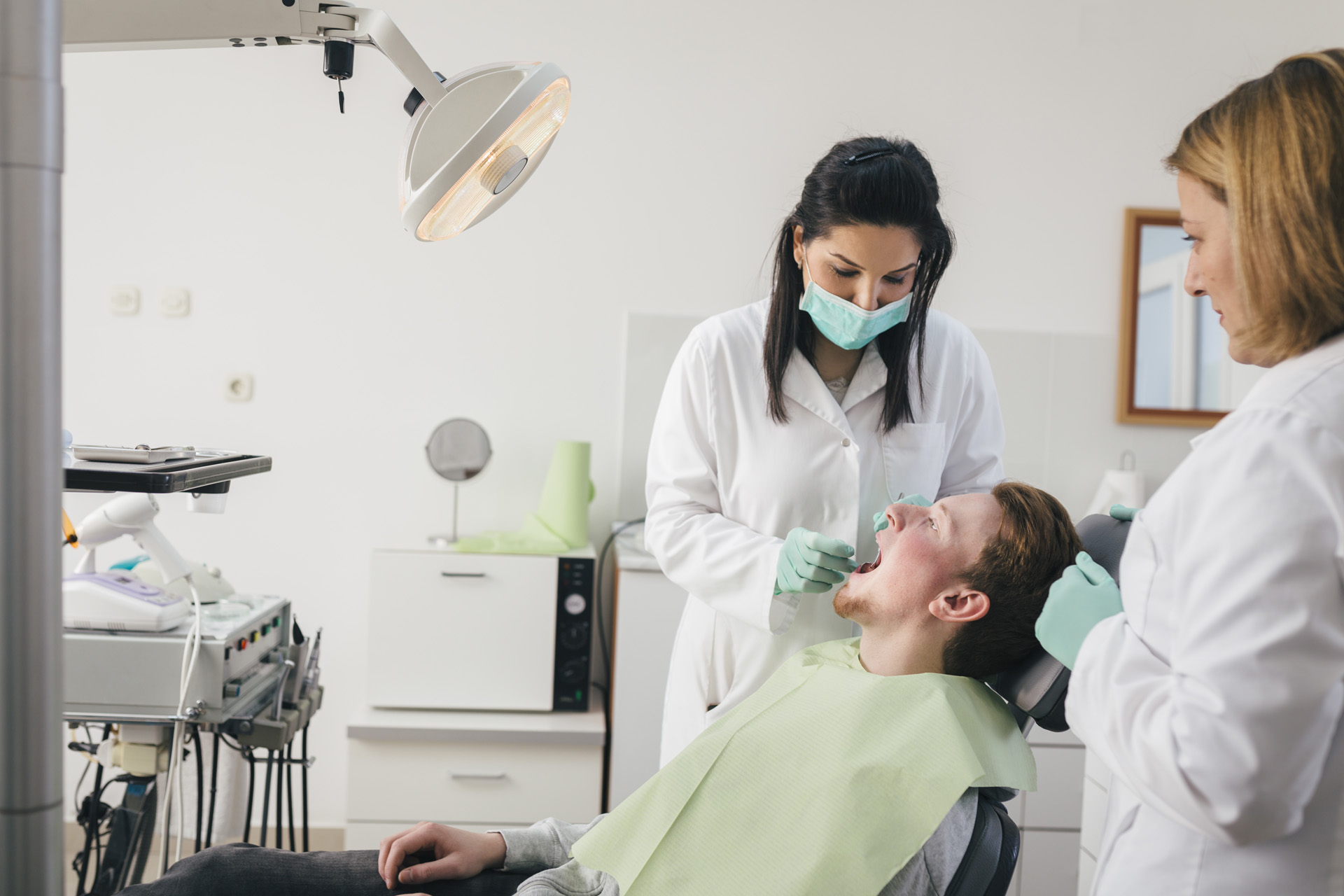 Man at dentist getting a check up