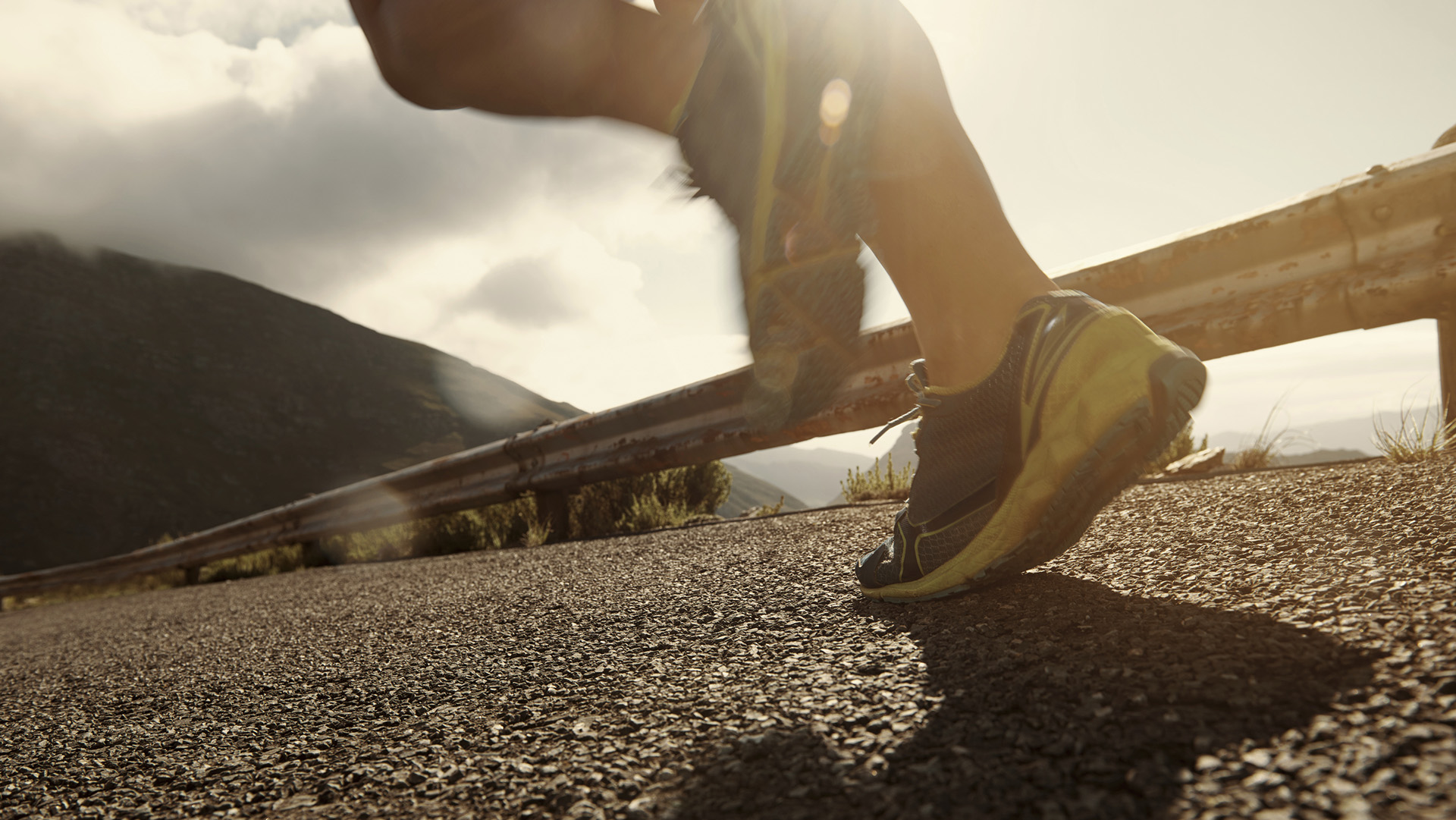 Cropped shot of an athlete running along a roadhttp://195.154.178.81/DATA/i_collage/pu/shoots/804604.jpg