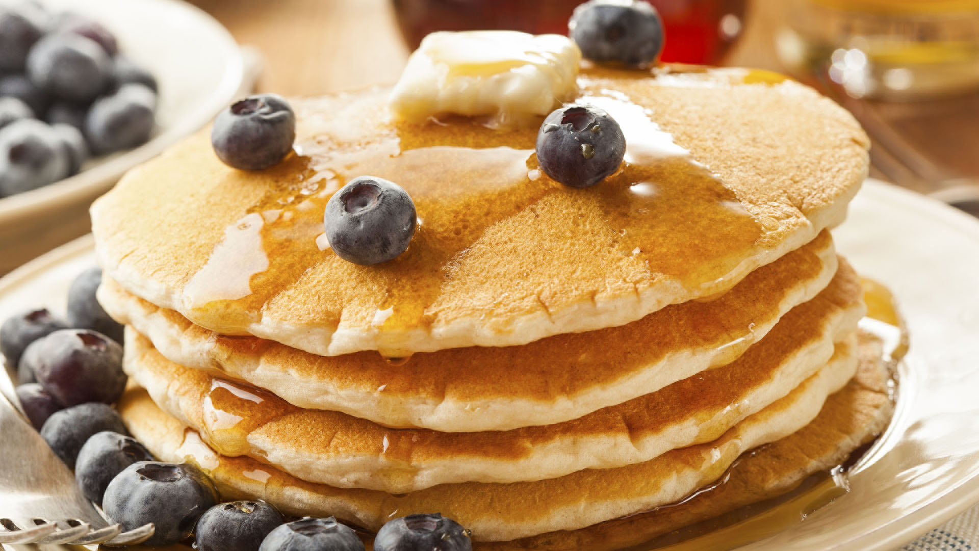 Homemade Buttermilk Pancakes with Blueberries and Syrup