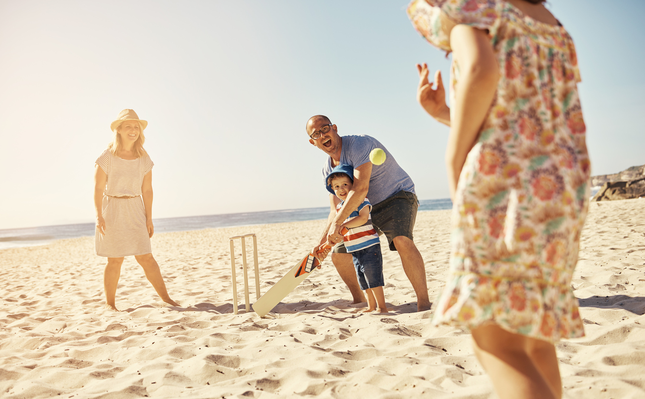 Shot of a happy family playing cricket on the beachhttp://195.154.178.81/DATA/i_collage/pu/shoots/806441.jpg