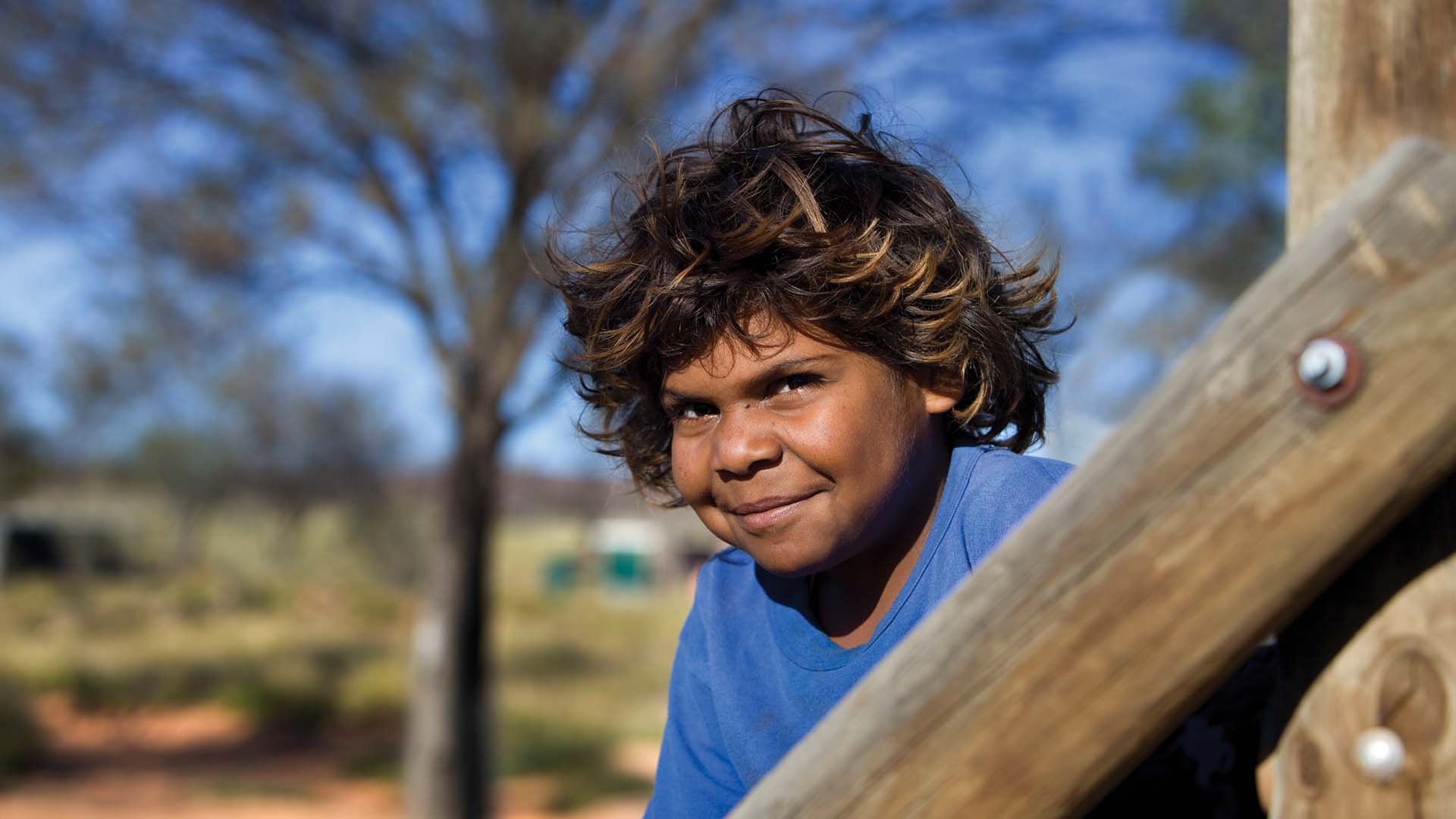 Indigenous girl smiling at the camera