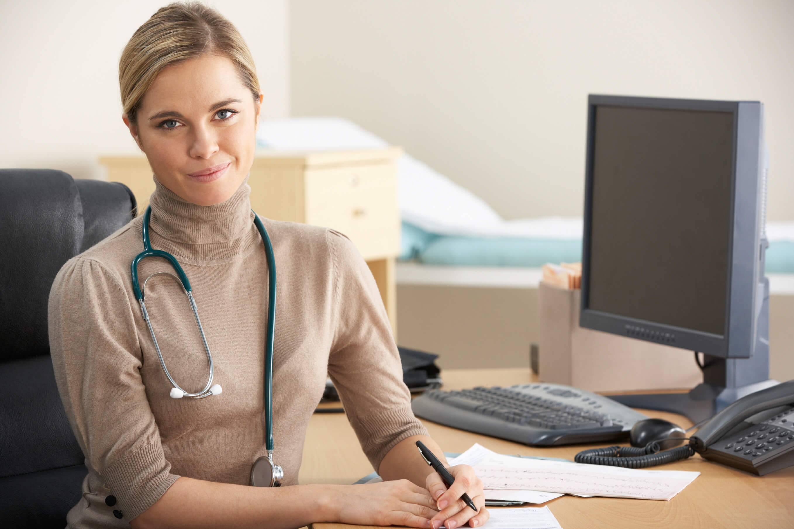 Female Doctor sitting at desk