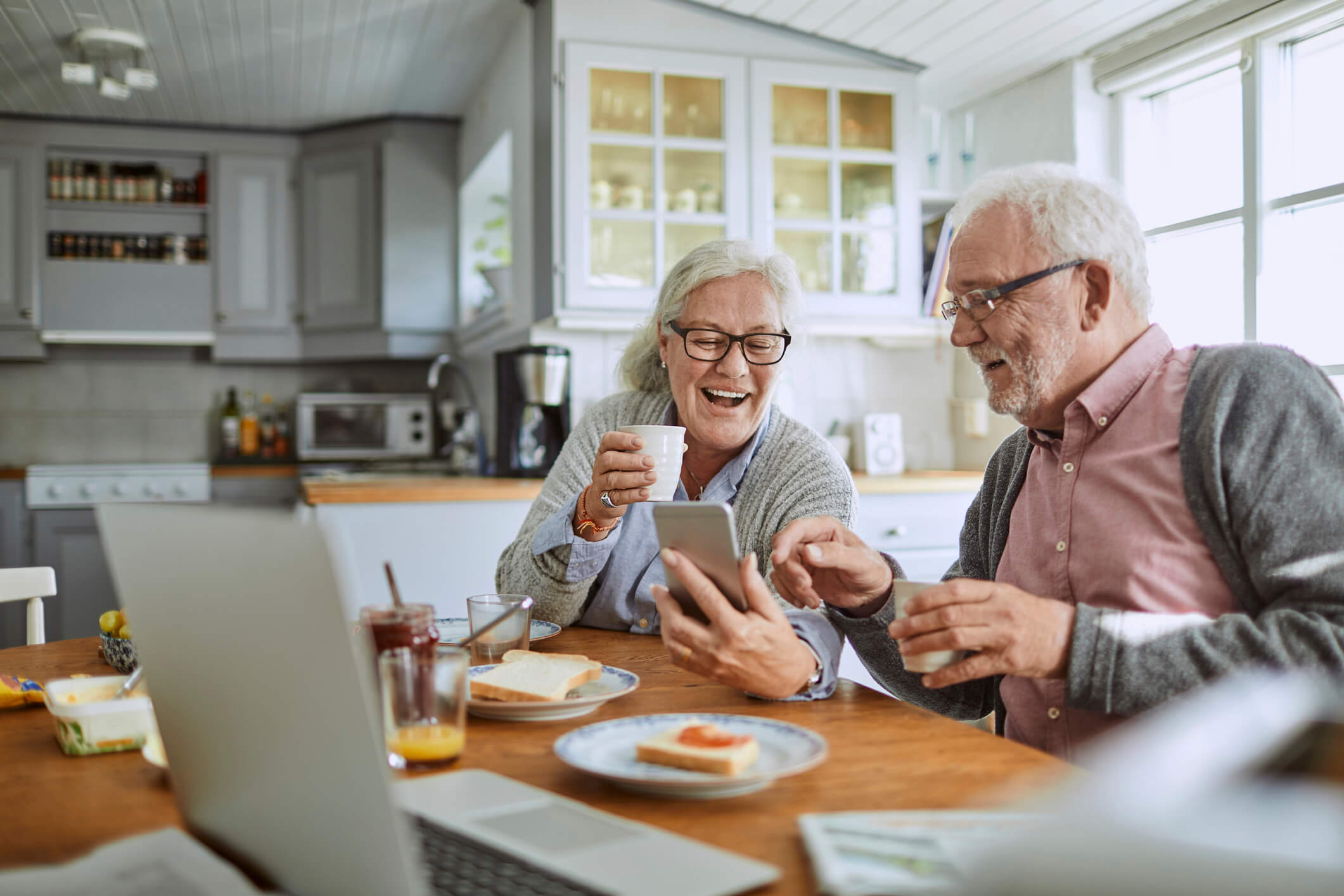 mature couple talking at the table