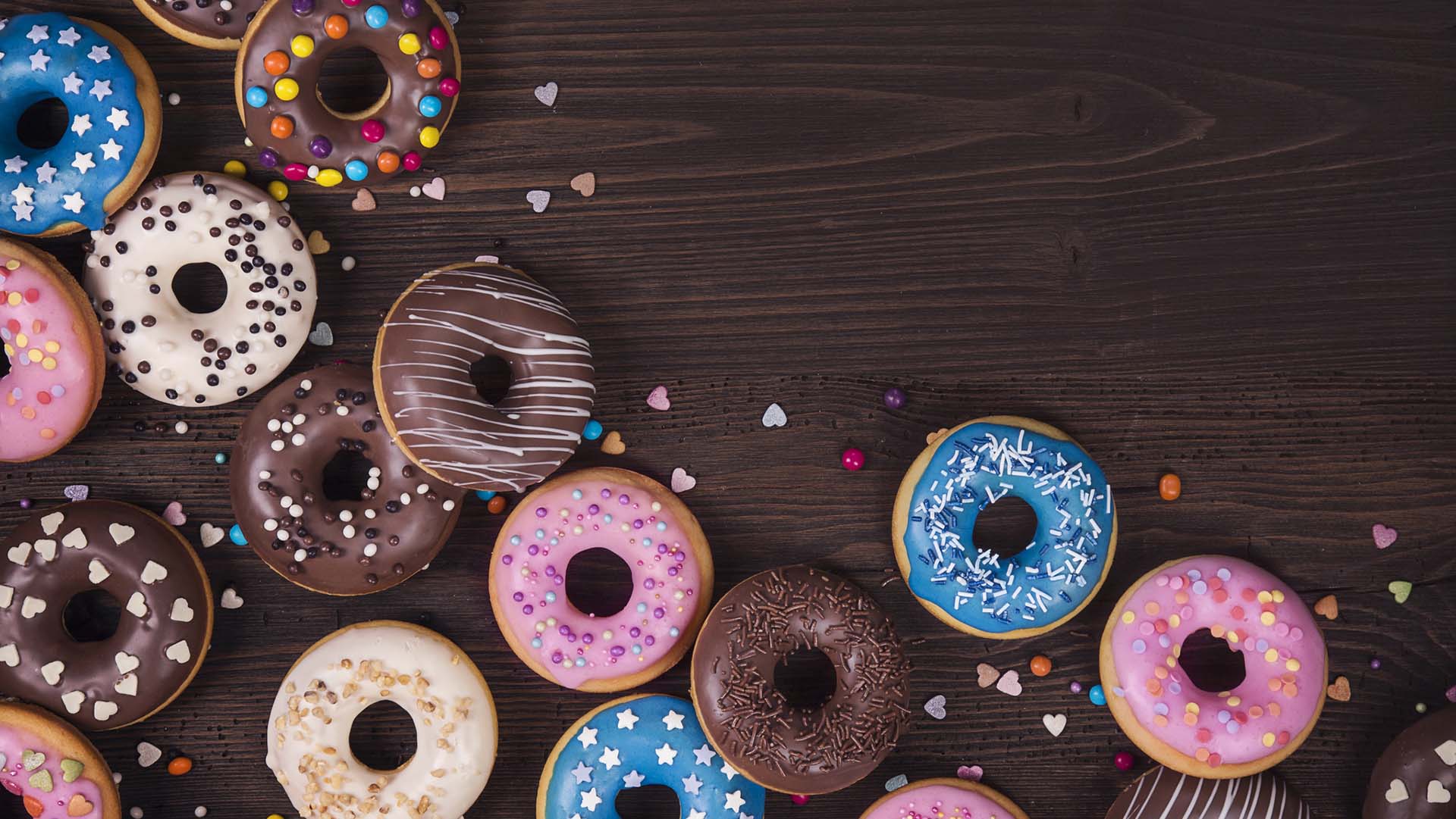 Donuts on a dark wooden background