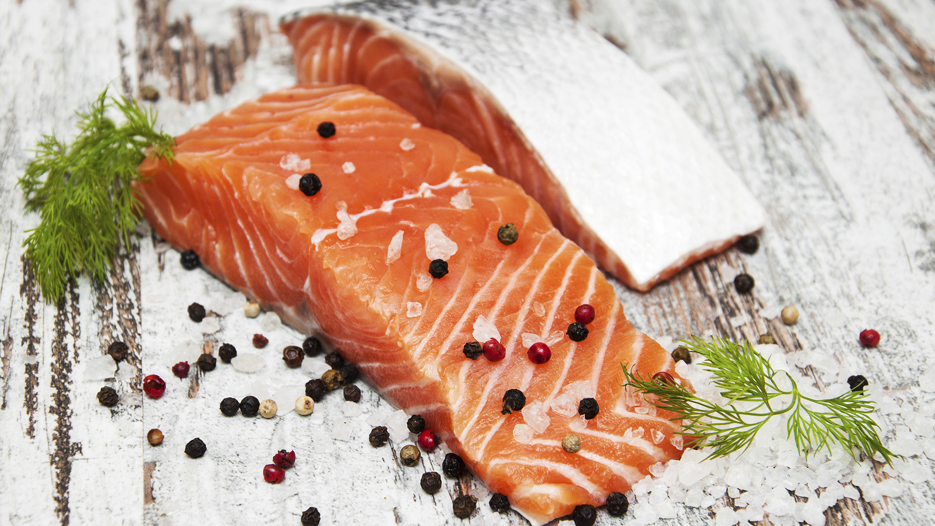 portions of fresh salmon fillet with aromatic herbs, spices