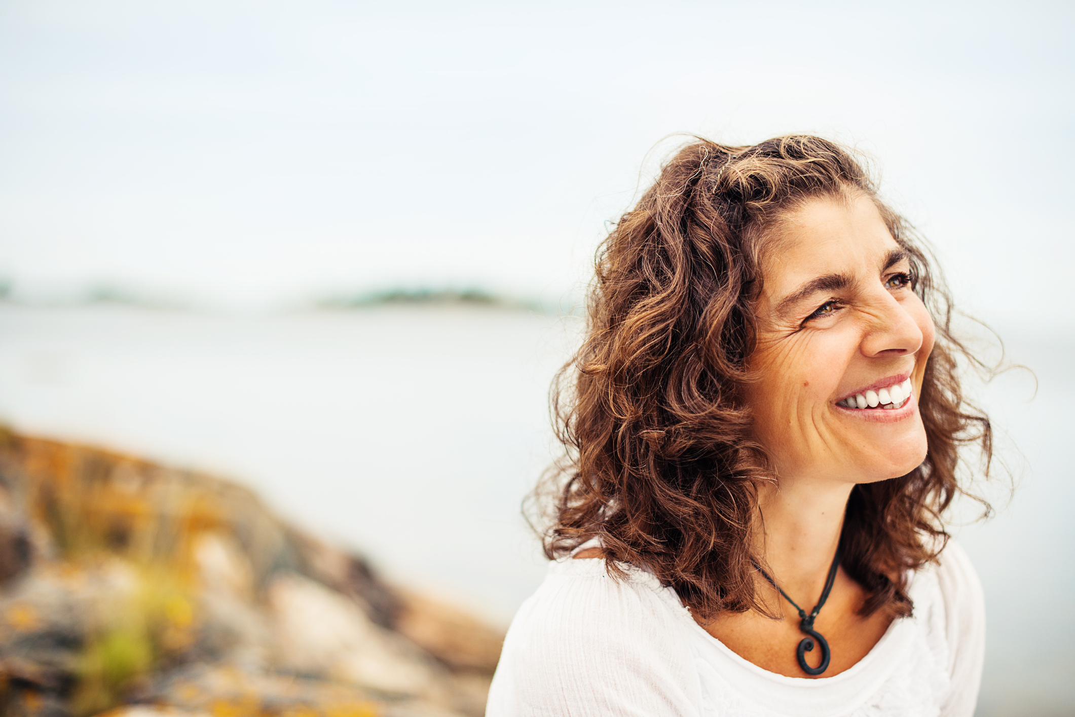 A woman takes a moment during the day for mindfulness.