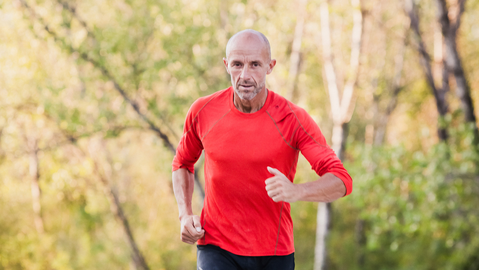 Strong man doing workout outdoor. He is  Max Calderan, the famous extreme desert Explorer.