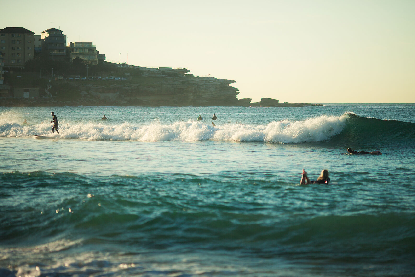 Surfers in Bondi beach winter day