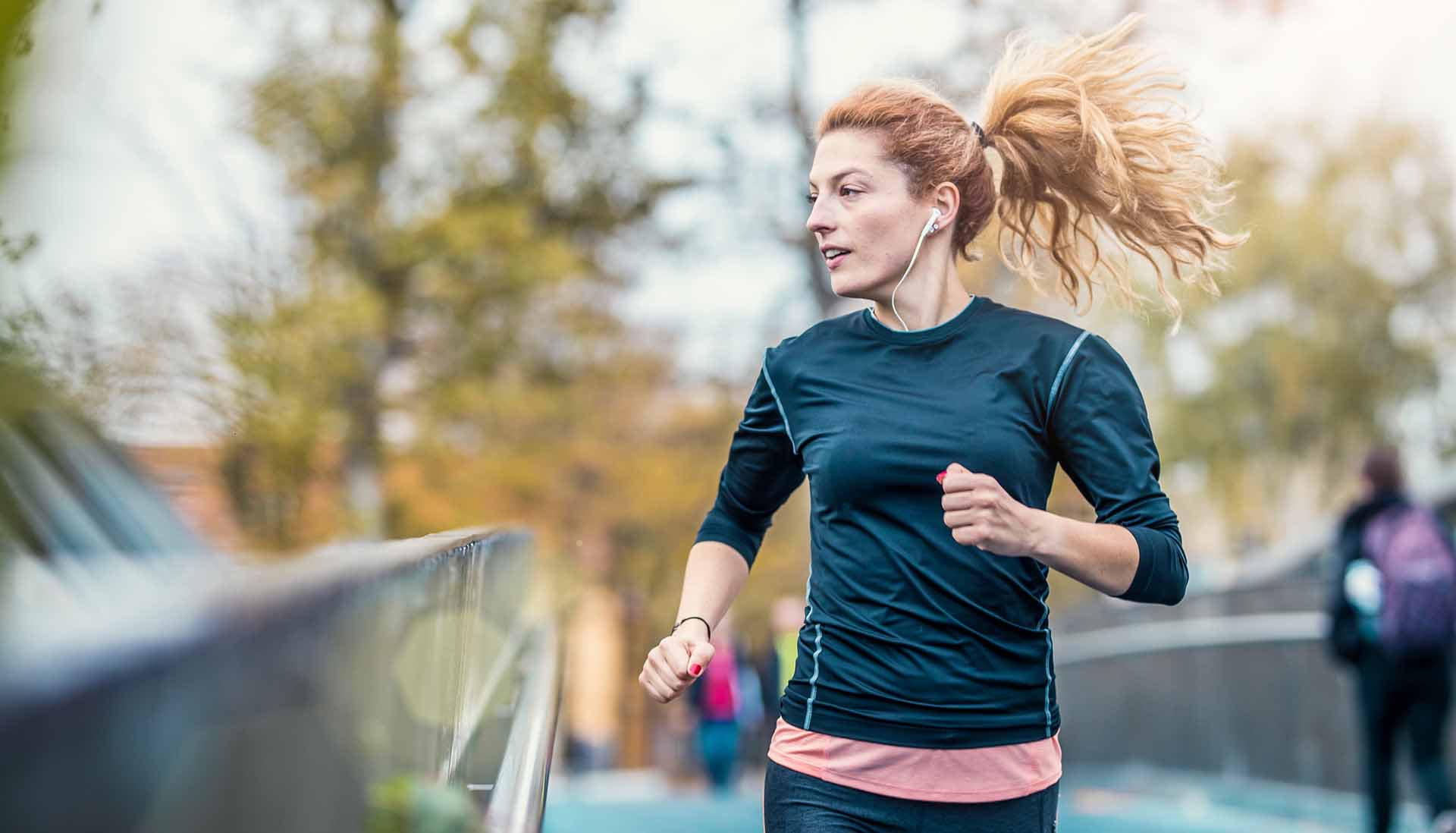 Female Athlete Running Outdoors