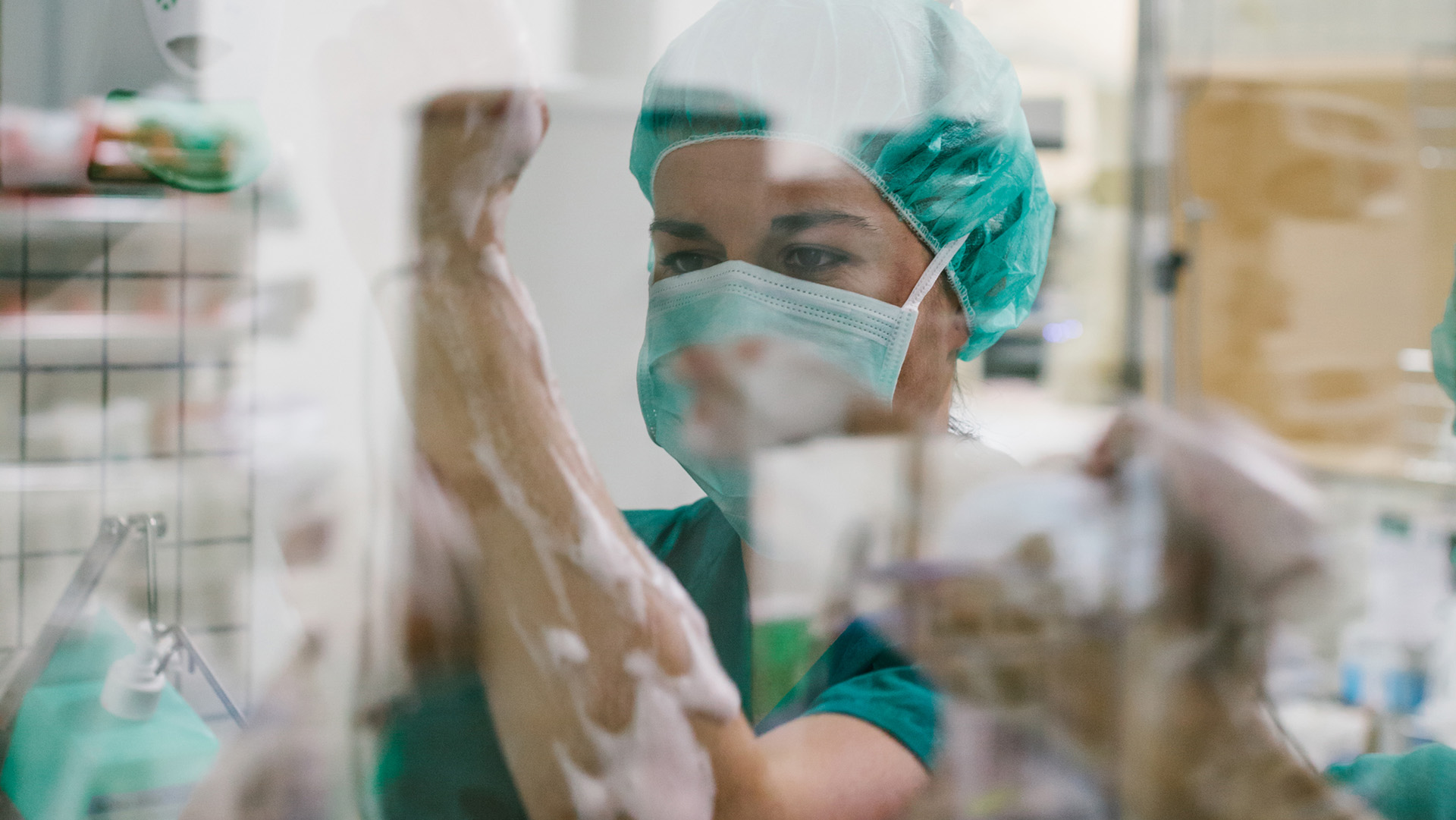 Couple of Surgeons Washing Hands Before Operating