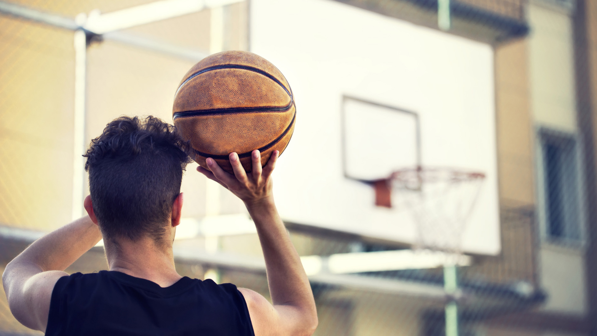 young basketball player ready to shoot