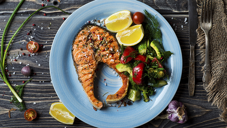 Grilled salmon fillet with vegetable salad