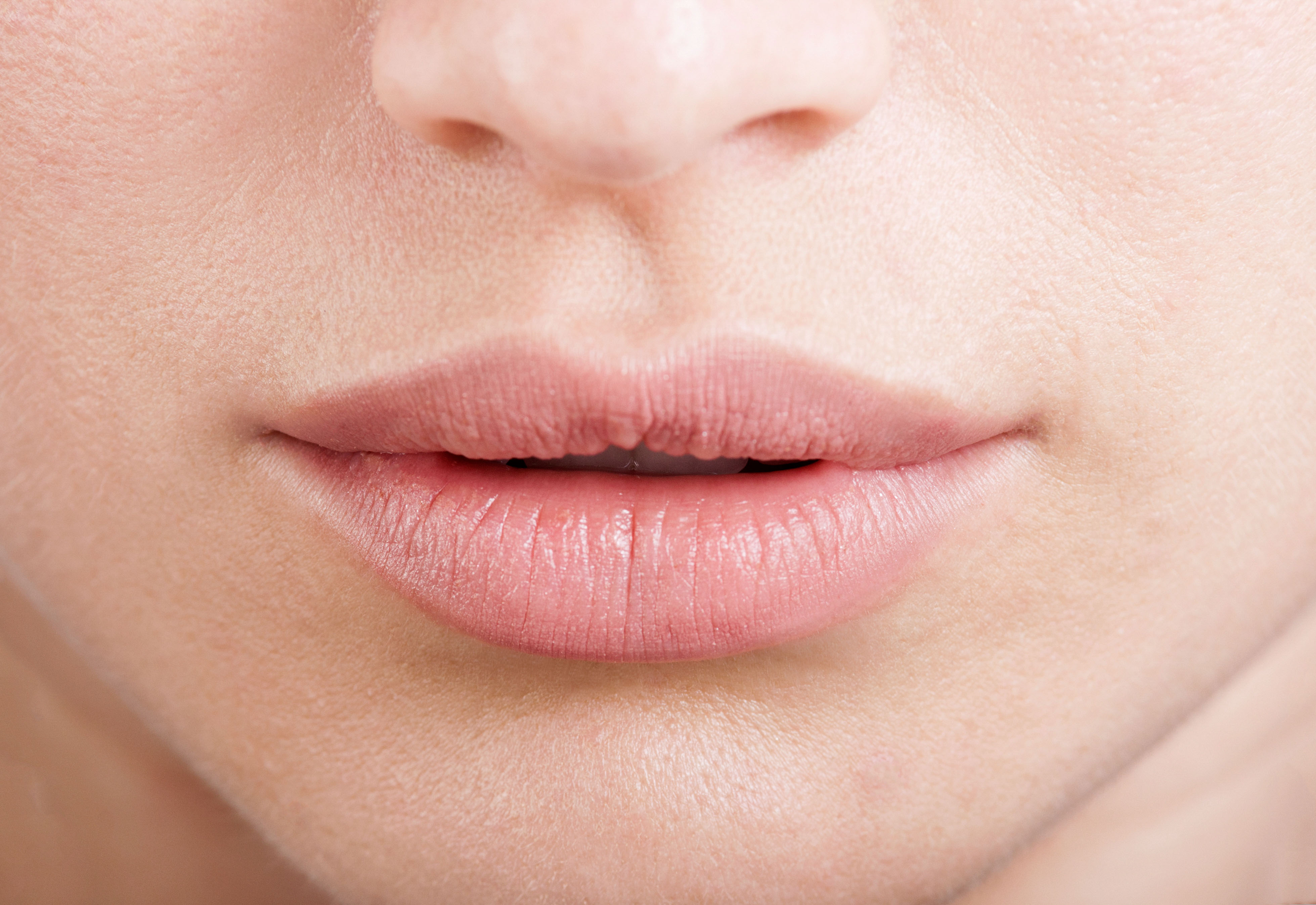 Hylauronic acid or botox female lips. Beauty and healthcare concept