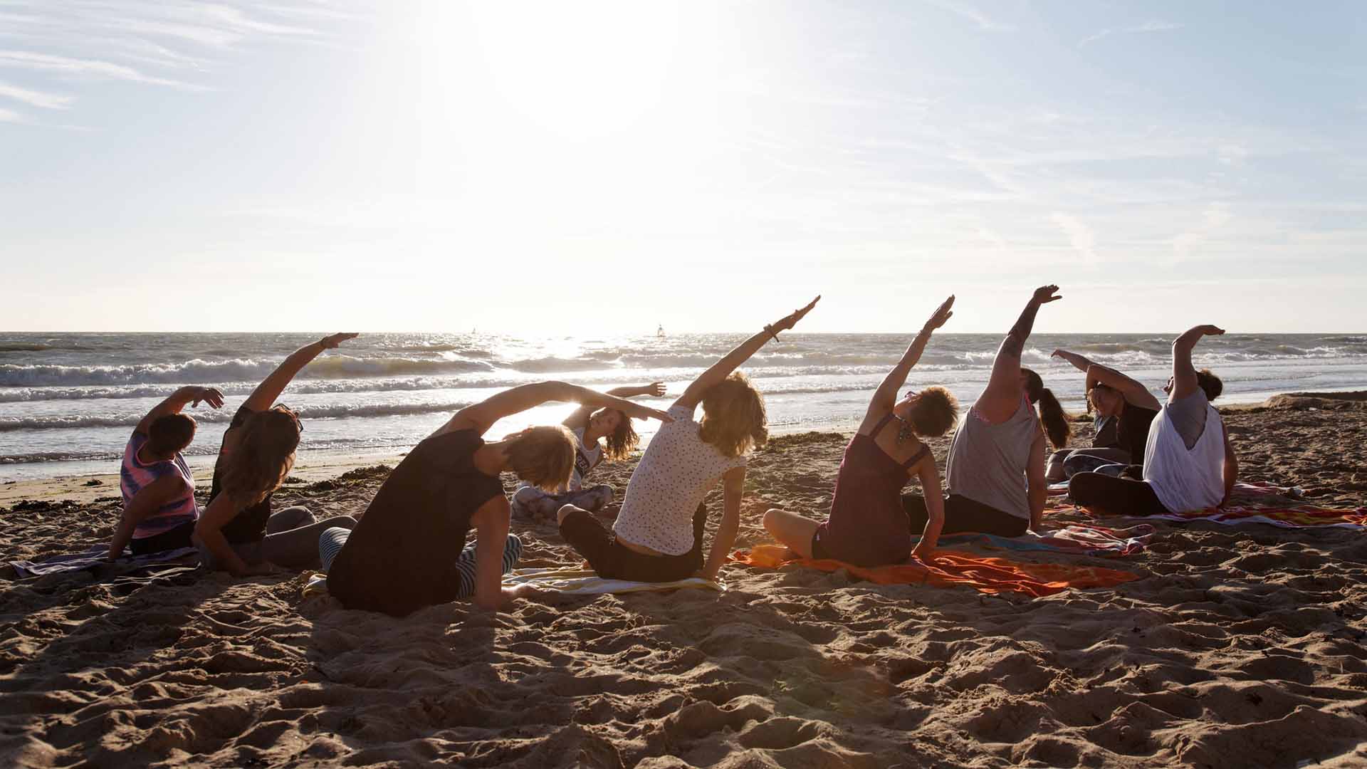 Yoga class by the sea