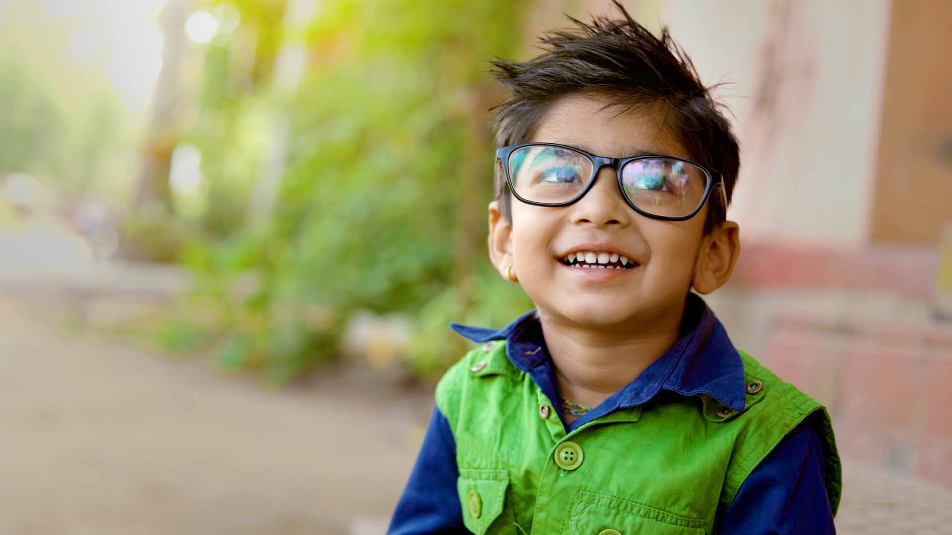 Indian child wear eyeglass