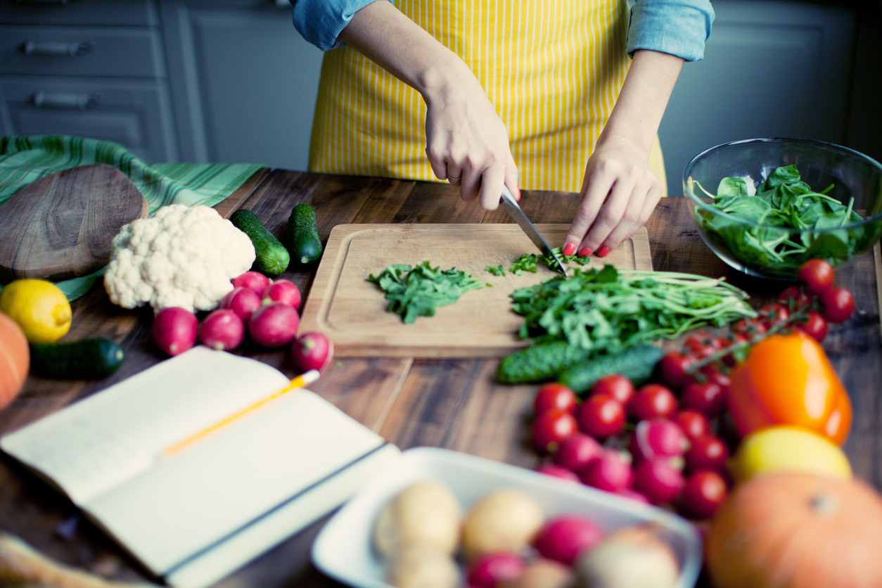 vegetables on table and a list