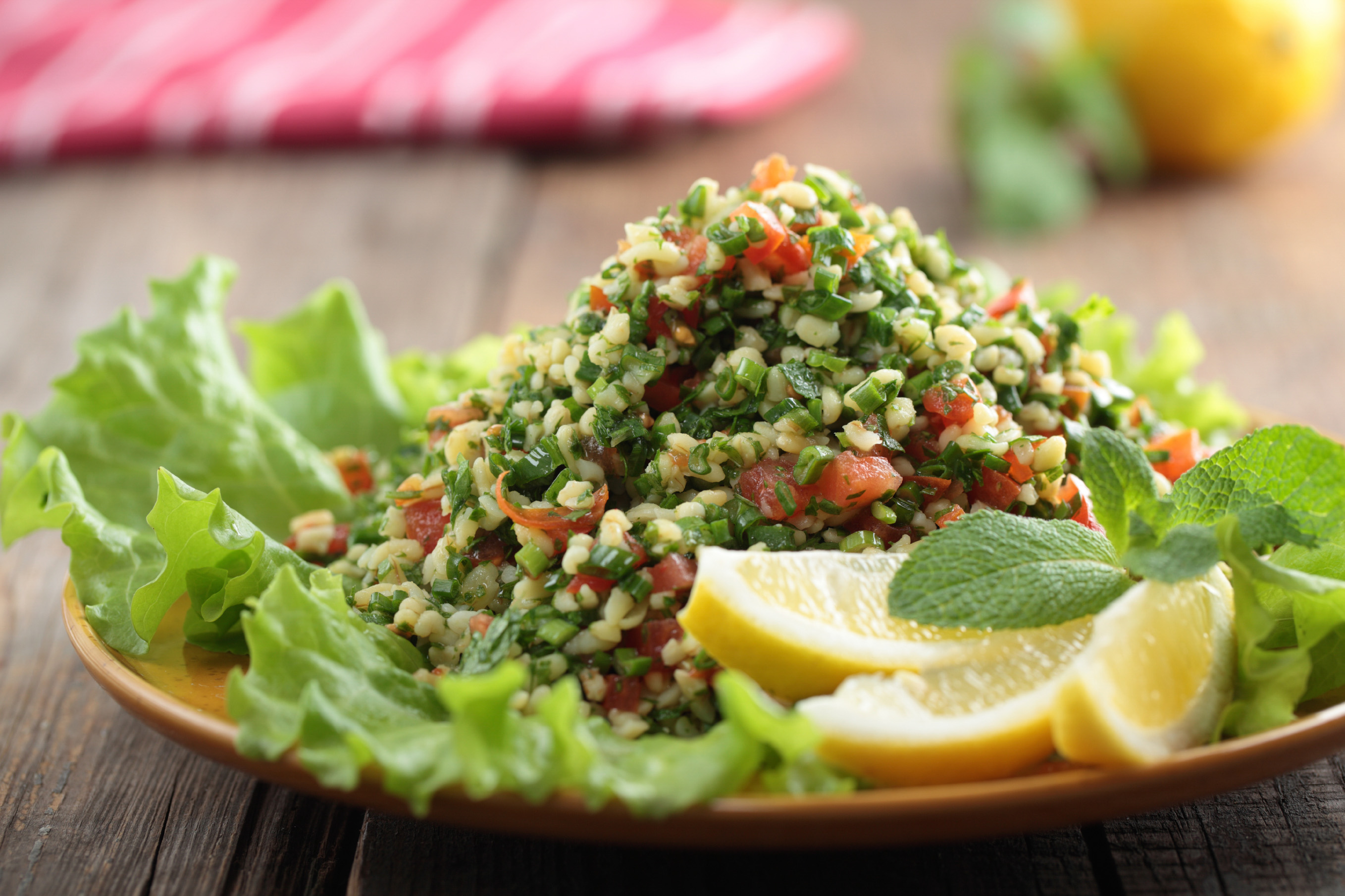 Tabbouleh salad closeup on a rustic table