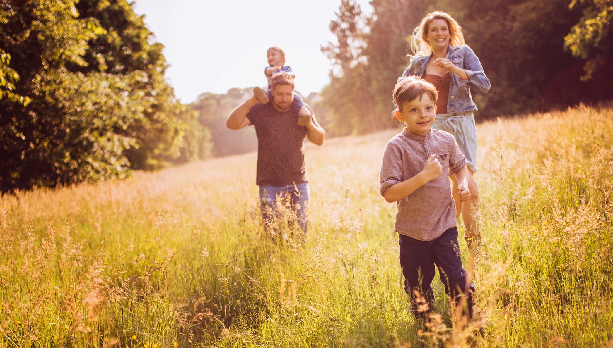 Retro family exploring park together