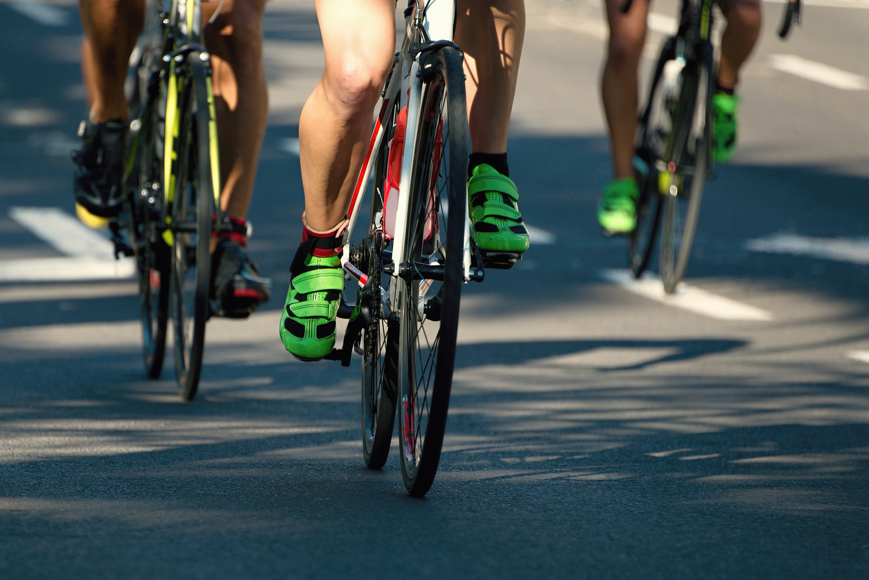 Cyclist athletes riding a race at high speed