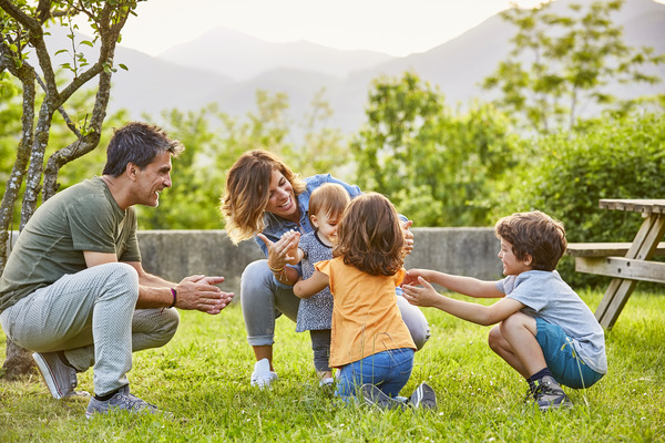 parent with children outdoors