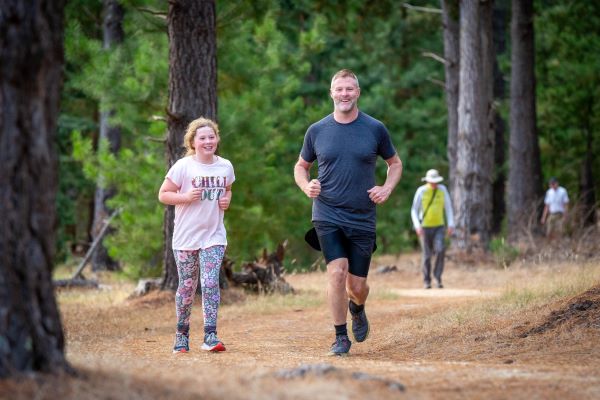 A father and daughter on the parkrun track