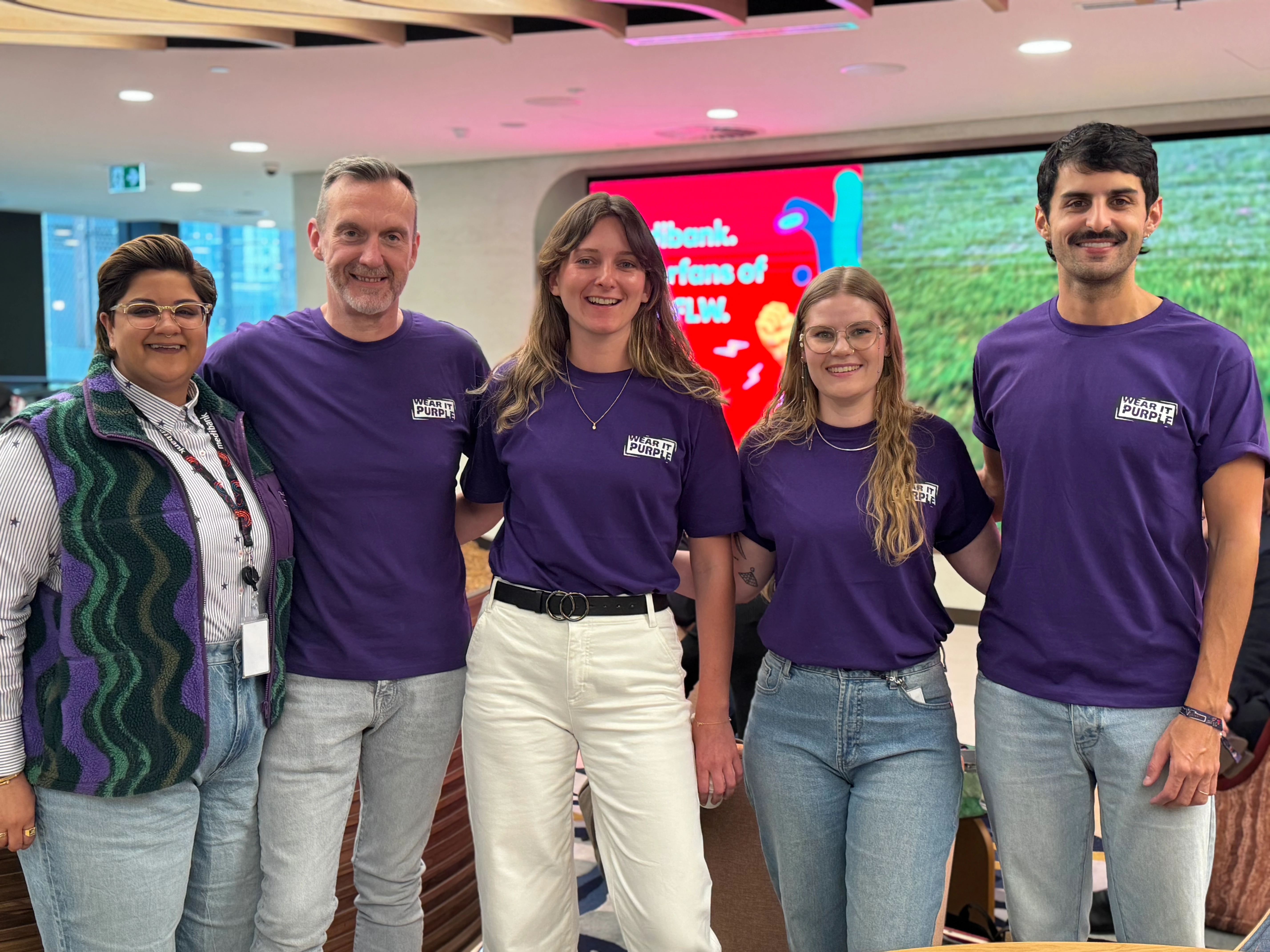 A group of people volunteering making food