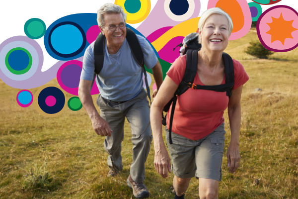 Woman smiling in the sun with heart graphics on her chest